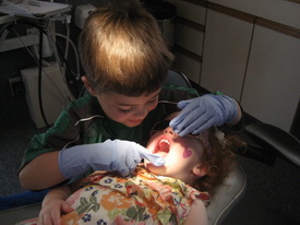 Kids playing dentist